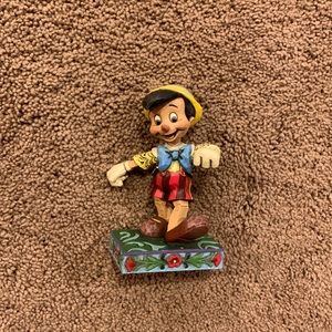Jim shore pinocchio “lively step” disney collection